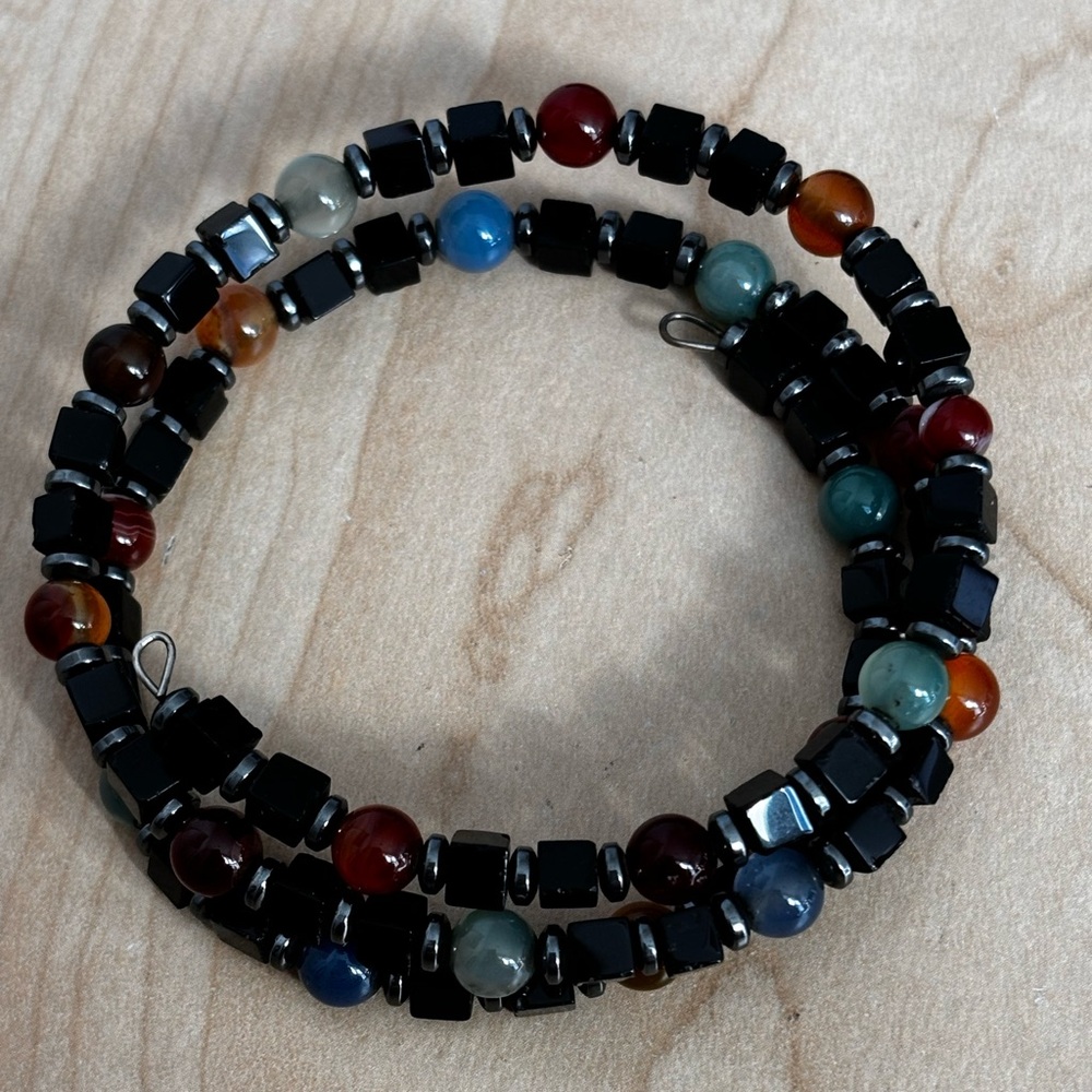 Glass beaded bracelet/ fits size 7 1/4 in wrist/ vibrant colors